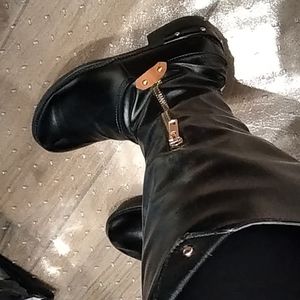 Black faux leather boots...with a zipped pocket to carry credit card, etc.!